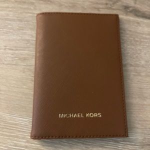 Michael Kors passport case in brown Soffiano leather
